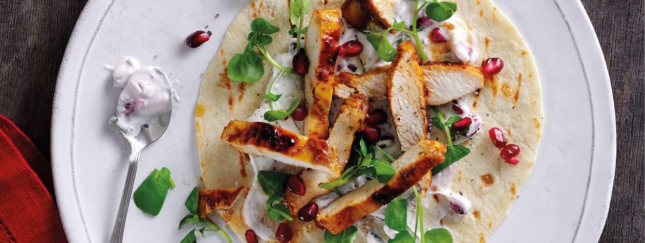 Sticky Ras-El-Hanout Chicken Wraps with Yoghurt, Mint & Pomegranate Dressing