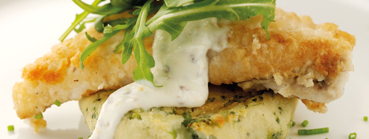 Roasted Monkfish served on Broccoli Potato Cakes with a Yoghurt Dressing